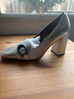 NIB Coach stunning silver heels with signature buckle